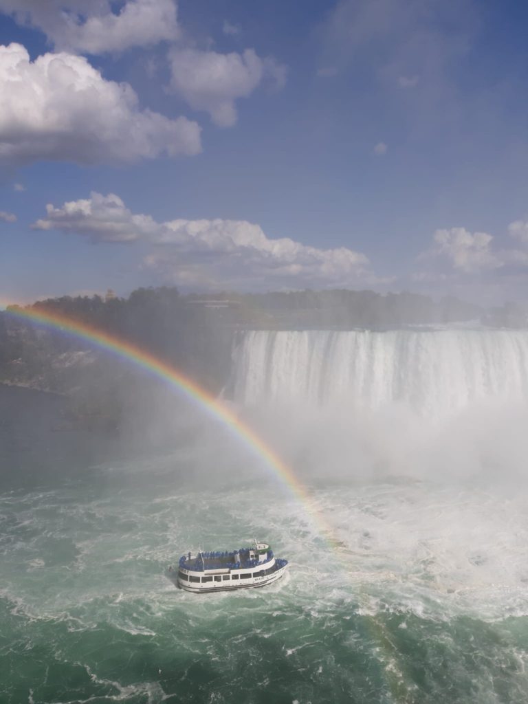 Niagara Falls a rainbow and a boat